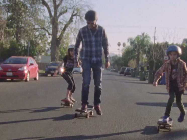 Happy people on skateboards